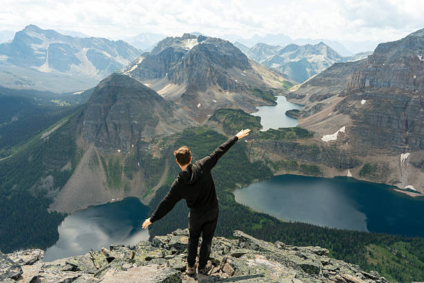 istock Mountain Summit Success: Conquering Peaks with Open Arms 2239825096