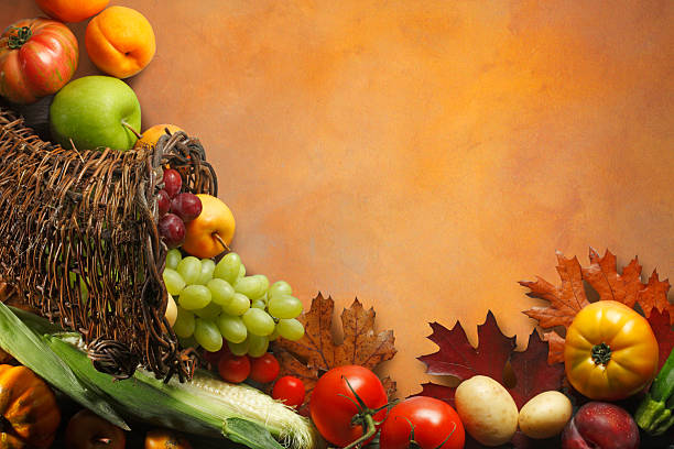 Healthy Autumnal fruits and vegetables arranged side by side on kitchen table. Fresh organic seasonal produce banner. Overhead view on wooden plank. Raw vegetarian food for nutrition and wellness, healthy diet and vegetable choice