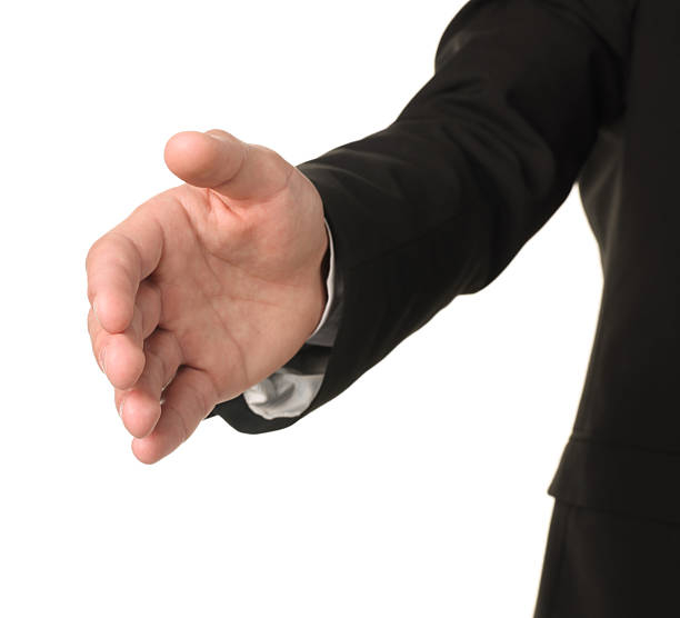 istock Offering help. Man reaching his hand on white background, closeup 2239831910