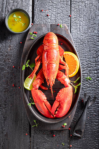 istock Cooked lobster with orange and butter sauce. 2239836103