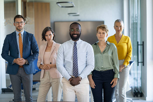 istock Confident business team posing in modern office 2239843082