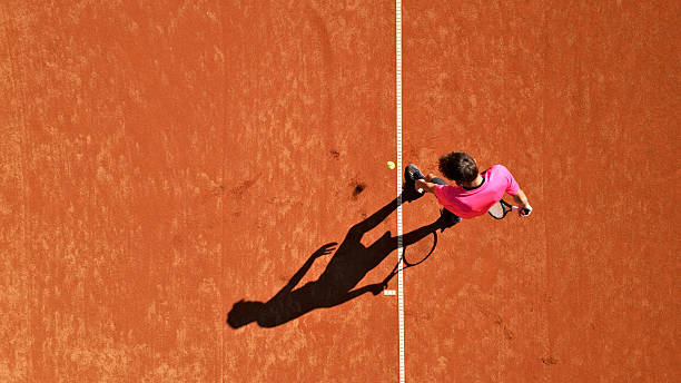 istock Young Athlete Practicing Tennis on Clay Court 2239843532