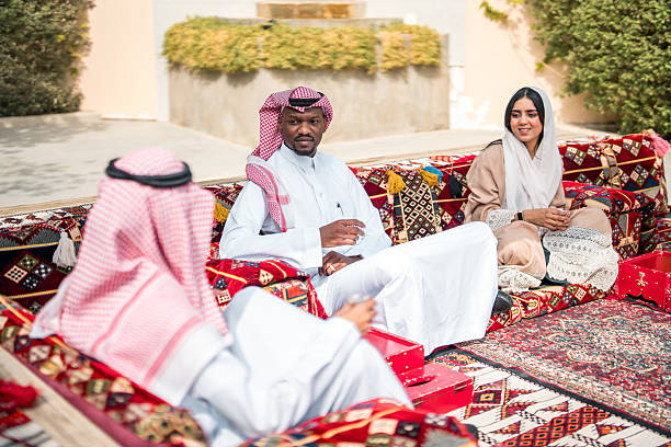 istock Diverse Group Relaxing in Traditional Arabian Majlis 2239844181