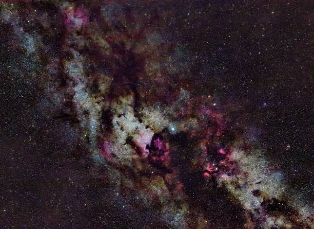 istock The Milky Way and the red nebulae 2239849443