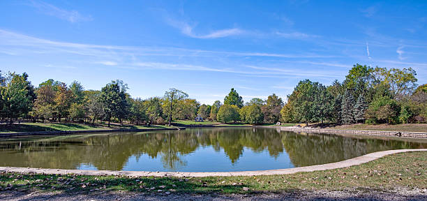 istock Calm Waters on a Large Urban Park Pond 2239851212