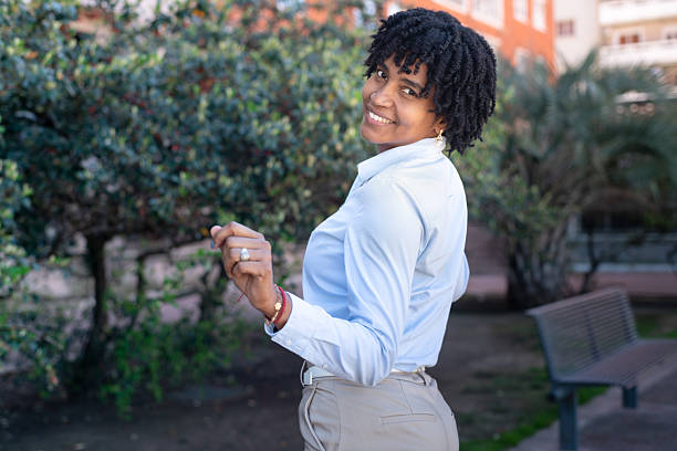 istock Beautiful Smiling black woman looking back, 2239852612