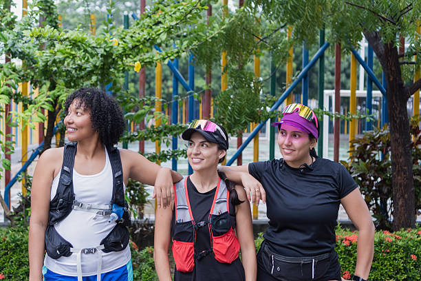 Three friends bonding together after a trail running session