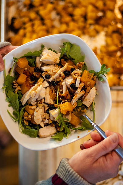 istock Bowl of roasted squash salad with chicken and arugula 2239853991
