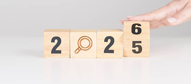 istock 2025 year change to 2026 year block with magnifying glass icon. SEO, Search Engine Optimization, hiring , Advertising, Idea, Strategy, marketing, Keyword, Content and New Year start concepts 2239859939