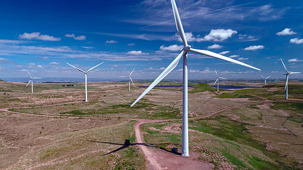 istock Construction and assembly of wind generators in fields with meadows and lakes 2239864173
