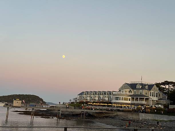 istock Coastal Hotel at Sunset with Moon in Bar Harbor 2239867844