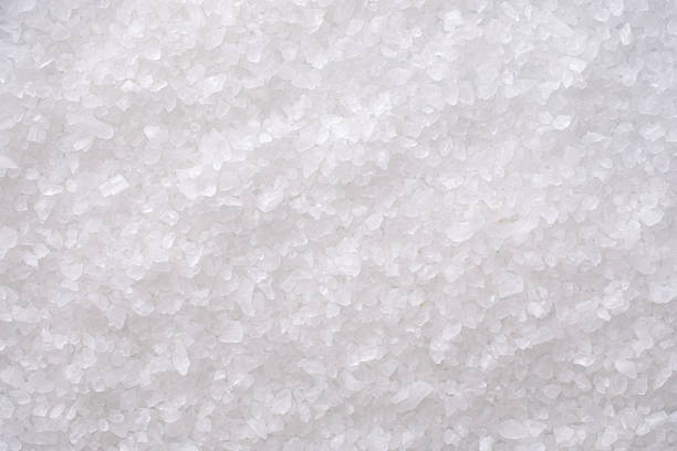 istock Sea salt texture pattern as a culinary food background top view. 2239868860