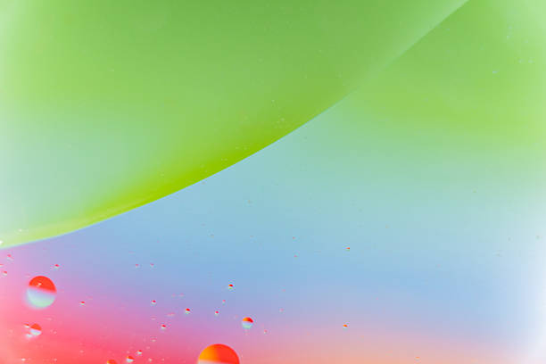 istock Red Blue Green Macro Fluid Gradient with Oil and Water Bubbles 2239869031