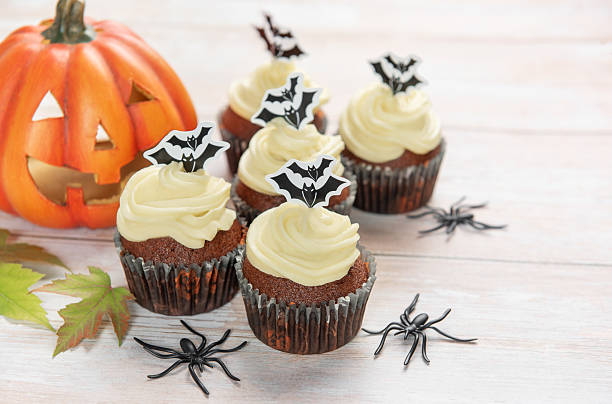 istock Halloween cupcakes decorating with bats, pumpkin, and spiders 2239873163