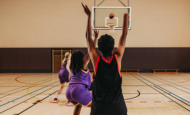 istock Leading the way: Female player makes a game-winning shot 2239882216