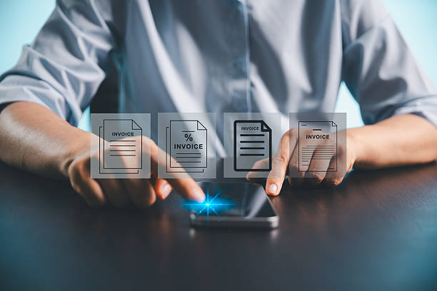 istock Businesswoman manages electronic statements, digital receipts on virtual screen, utilizing concept of e-invoice, digital billing, online invoice processing as smart e-tax and tax accounting solutions. 2239883264