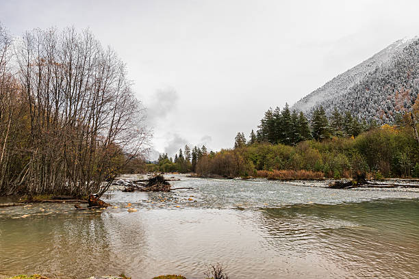 istock Autumn mountains in a snowy haze 2239885912