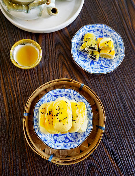 istock Chinese pastry dessert (Fresh milk mooncakes) with tea, Top view 2239891870