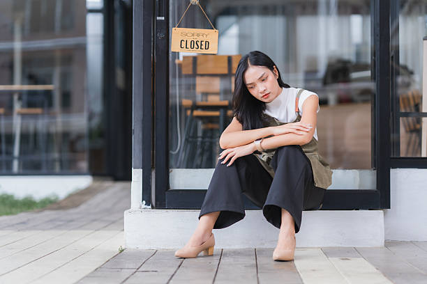 istock Small business owner feeling sad about store closing 2239893373