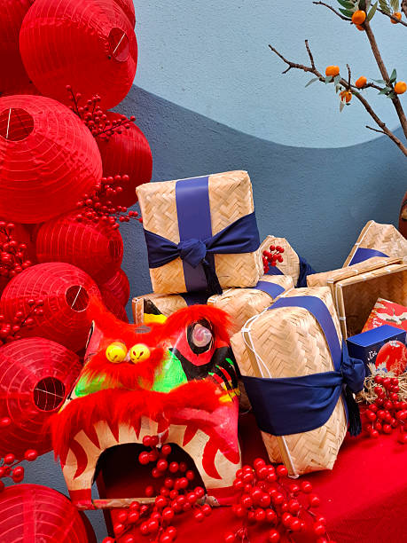 istock Vietnamese Tet Holiday Decoration with Gift Boxes and Lanterns 2239894234