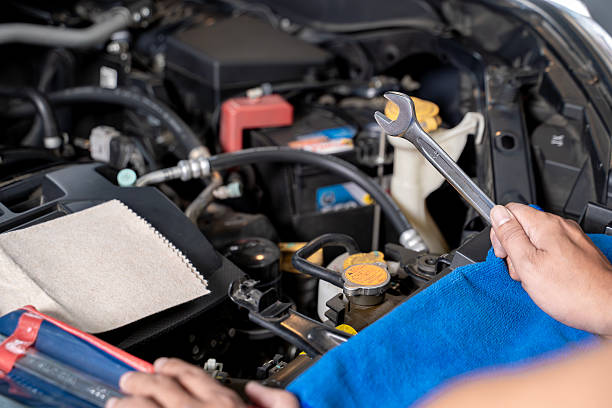 istock Young Man Repairing Engine at Home Garage 2239895431