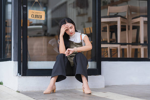 istock Business owner feeling stress outside closed cafe 2239895827