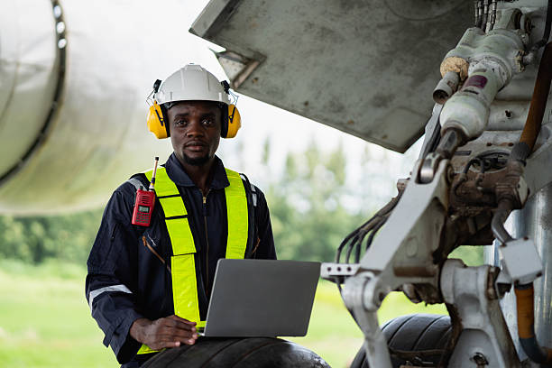 istock Aircraft maintenance engineer inspecting airplane engine with safety equipment and tools, aviation mechanic ensuring aircraft repair, safety check, and technical engineering service. 2239896905