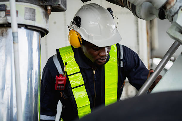 istock Aircraft maintenance engineer inspecting airplane engine with safety equipment and tools, aviation mechanic ensuring aircraft repair, safety check, and technical engineering service. 2239897225