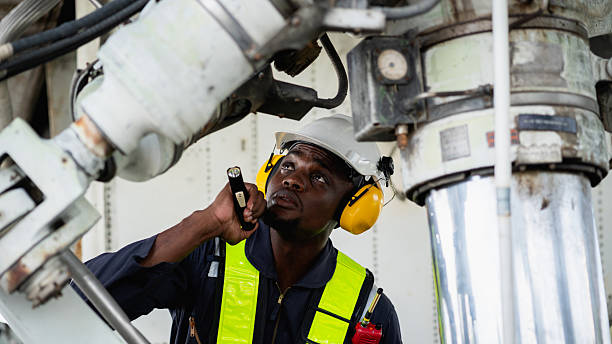 istock Aircraft maintenance engineer inspecting airplane engine with safety equipment and tools, aviation mechanic ensuring aircraft repair, safety check, and technical engineering service. 2239897351