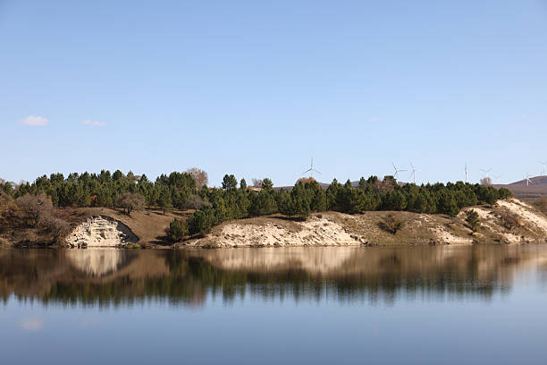 istock Autumn grassland lake reflection 2239898855
