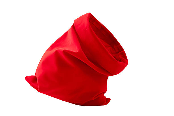 istock Santa opened red bag isolated on white, Christmas sack cutout. 2239902118