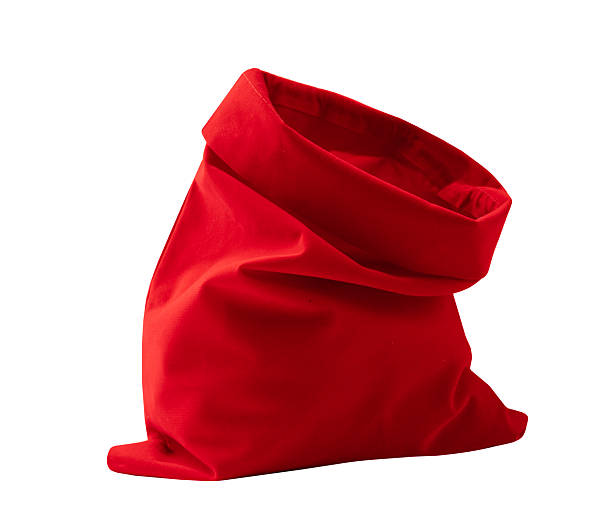 istock Santa Clause bag opened isolated, empty red sack laying cutout. 2239902119