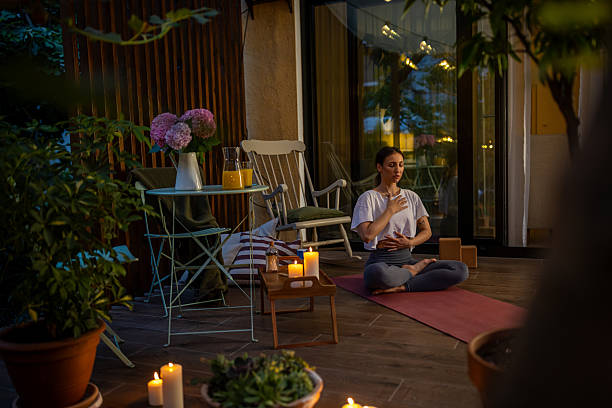 istock Evening Home Meditation Session on a Cozy Candlelit Balcony 2239905037