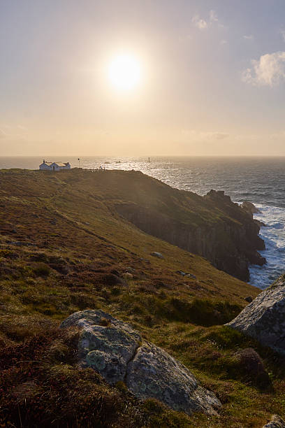 istock Land's End coastline, Cornwall, England, UK during sunset 2239905810