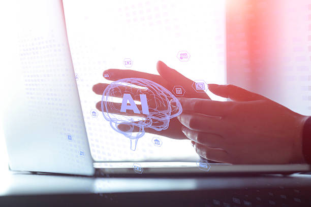 istock A person is using a laptop with a blue screen and brain with ai word 2239907058