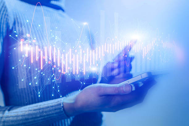 istock Hands indicating stock market graphs on blue background, business growth visualization. 2239915832