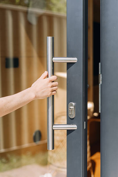 istock Modern front door with transparent glass and stainless steel handle 2239915977
