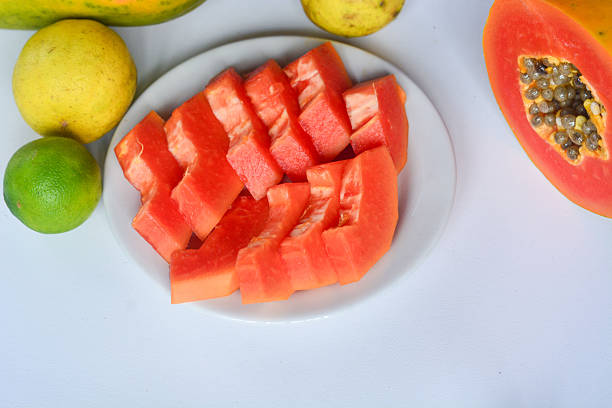 Papaya fruit (Carica papaya) in isolated white background, (papaya on white background)