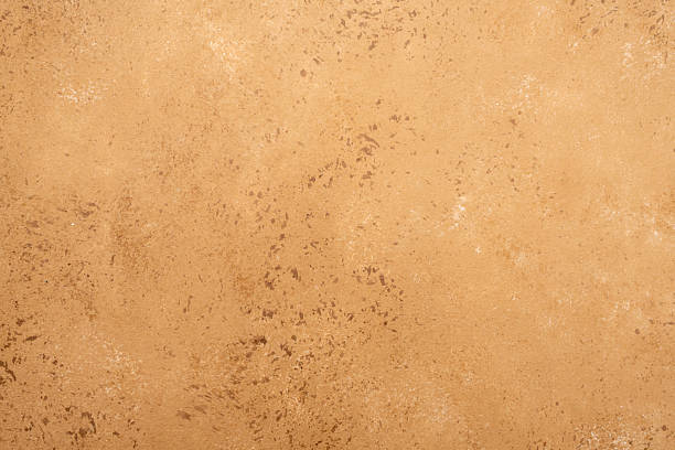 istock Textured brown background with rough stucco plaster wall 2239918184