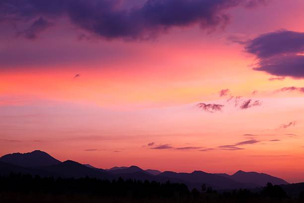 istock serene Vibrant Sunset Over Silhouetted Mountains 2239920475