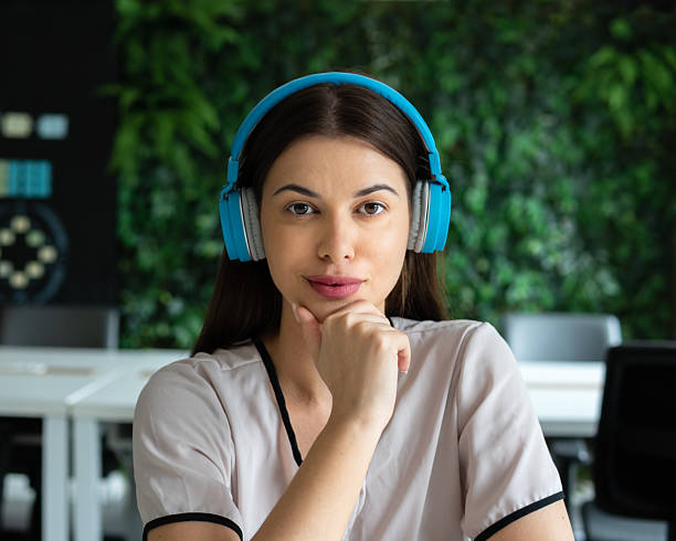 istock young woman portrait looking a camera in office workspace. 2239922239