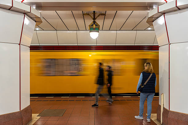 istock People on the platform in front of a departing subway 2239922583