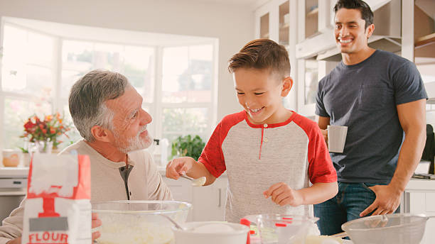 istock Three Generation Male Family In Kitchen At Home Having Fun Baking Together 2239925276