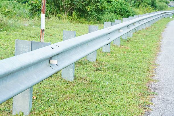 istock Highway guardrail with defocused car in the background. 2239925299