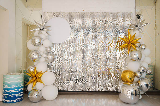istock Bright and festive party backdrop with shiny decorations for celebrations 2239925902