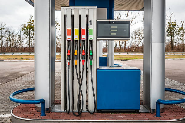 istock Petrol station with colored guns and fuel hoses. refueling column 2239932883