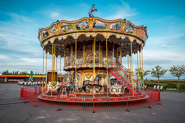 istock Old children's carousel on abandoned funfair 2239933009