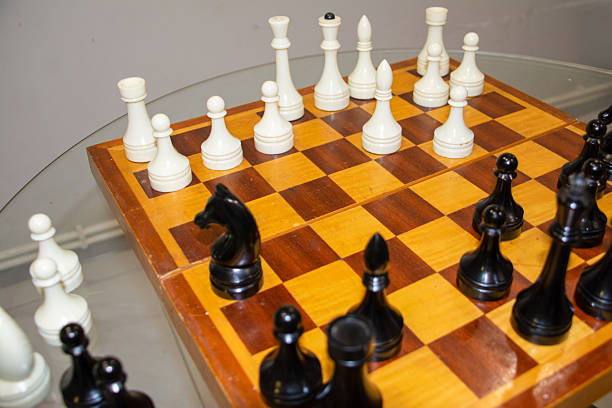 A chessboard with pieces. A chess game. Playing chess. Chess pieces