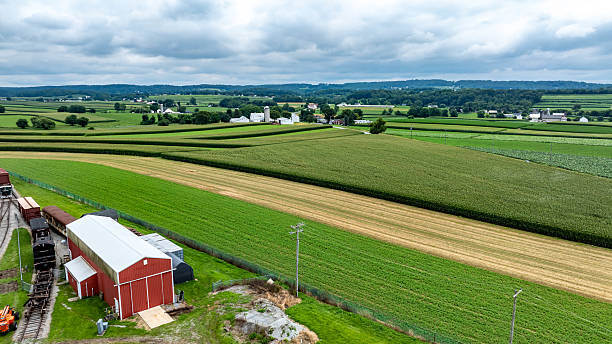 istock Lush Green Fields and Farm Structures Create a Picturesque Rural Landscape in Pennsylvania 2239936975