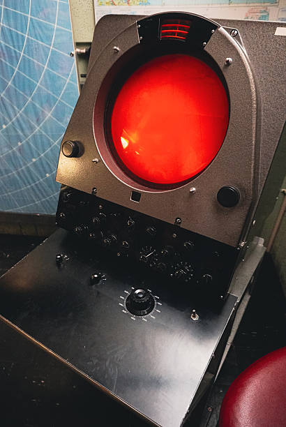 Ship control panel. a Navigational devices and echolocation and radar monitors.